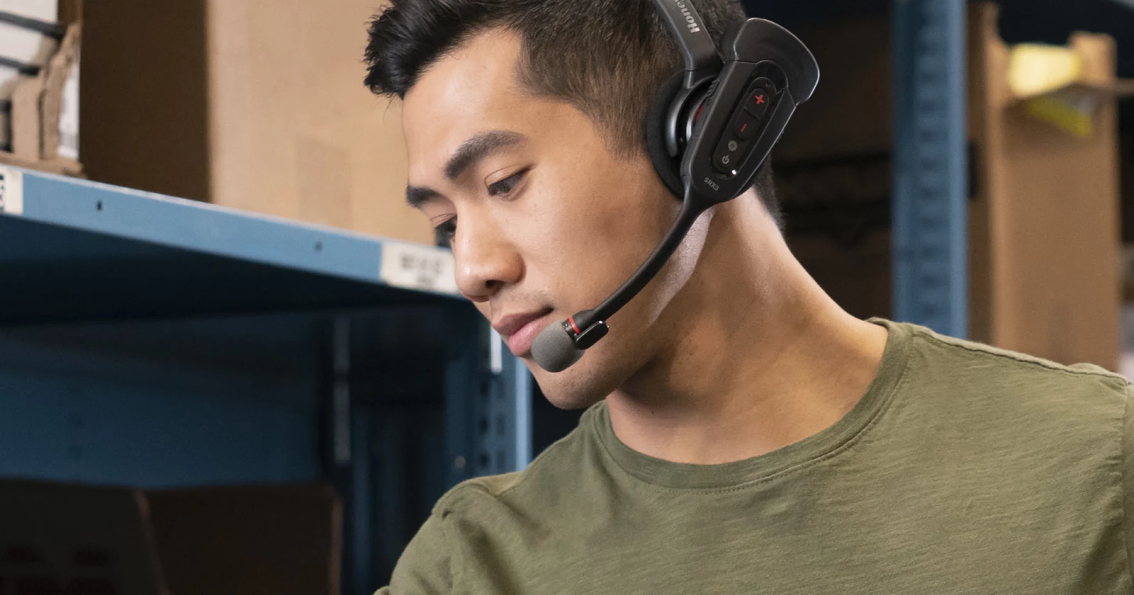Honeywell Moresport case-study worker picking clothing with a headset